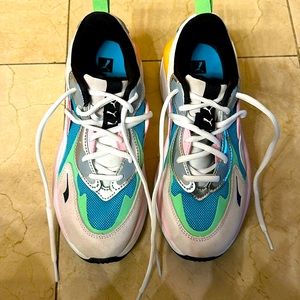 Once worn size 7.5 Puma sneakers in pale pink, turquoise, mint and yellow